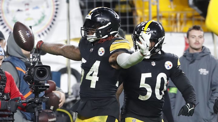 Nov 2, 2023; Pittsburgh, Pennsylvania, USA;  Pittsburgh Steelers linebacker Kwon Alexander (54) reacts after making an interception in the end zone against the Tennessee Titans at Acrisure Stadium. Pittsburgh won 20-16. Mandatory Credit: Charles LeClaire-Imagn Images