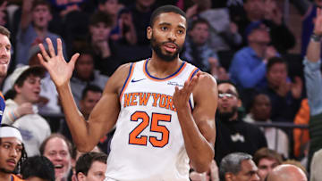 Dec 25, 2024; New York, New York, USA;  New York Knicks forward Mikal Bridges (25) reacts after hitting a three point shot in the fourth quarter against the San Antonio Spurs at Madison Square Garden. Mandatory Credit: Wendell Cruz-Imagn Images