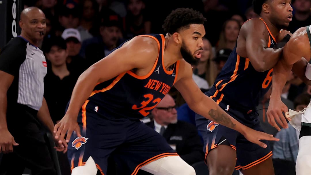 Nov 8, 2024; New York, New York, USA; Milwaukee Bucks forward Giannis Antetokounmpo (34) controls the ball against New York Knicks forward OG Anunoby (8) and center Karl-Anthony Towns (32) during the third quarter at Madison Square Garden. Mandatory Credit: Brad Penner-Imagn Images