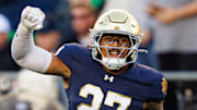 Notre Dame linebacker Kyngstonn Viliamu-Asa (27) celebrates  against NC State at Notre Dame Stadium.