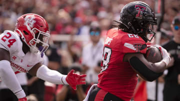 Texas Tech's running back Tahj Brooks (28) scores a touchdown against aces Houston in a Big 12 football game, Saturday, Sept, 30, 2023, at Jones AT&T Stadium.
