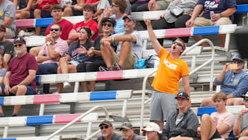 A lone Tennessee Volunteer fan woos during Rocky Top during a Major League Baseball game between the Atlanta Brave and Cincinnati Reds at Bristol Motor Speedway on August 3, 2025.
