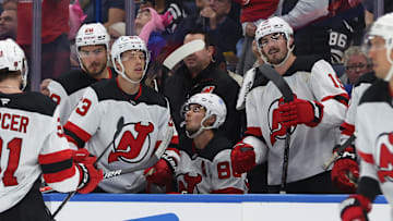 New Jersey Devils left wing Jesper Bratt (63) is congratulated  after he scored a goal. Mandatory Credit: Kim Klement Neitzel-Imagn Images