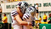 Kansas State Wildcats running back Dylan Edwards (3) celebrates with offensive lineman Will Anciaux (80) after scoring a touchdown against the Baylor Bears