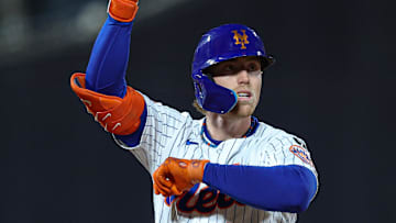 Apr 17, 2025; New York City, New York, USA; New York Mets third baseman Brett Baty (7) celebrates after a double during the seventh inning against the St. Louis Cardinals at Citi Field. Mandatory Credit: Vincent Carchietta-Imagn Images