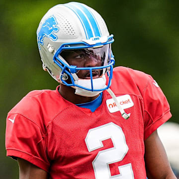 Former Detroit Lions quarterback Hendon Hooker (2) practices during training camp at team's Performance Center