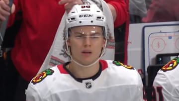 Connor Bedard reacts to a misconduct penalty.