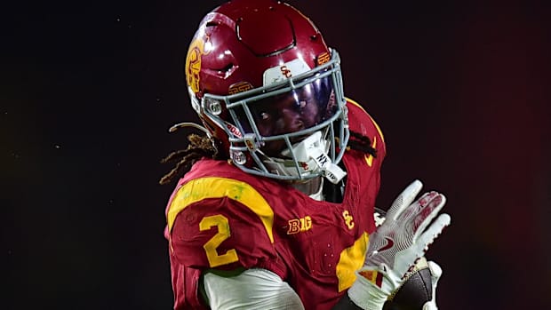 USC Trojans coach Lincoln Riley Michigan Wolverines coach Sherrone Moore Big Ten football College Football Playoff