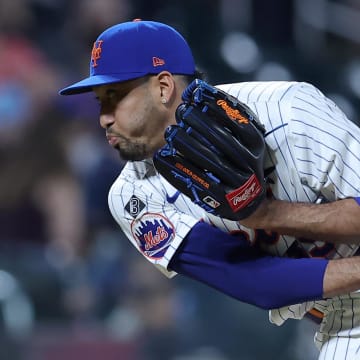 Jun 13, 2024; New York City, New York, USA; New York Mets relief pitcher Edwin Diaz (39) follows through on a pitch against the Miami Marlins during the ninth inning at Citi Field. Mandatory Credit: Brad Penner-USA TODAY Sports