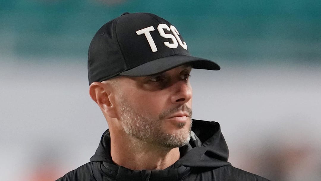 Jan 19, 2026; Miami Gardens, FL, USA; Las Vegas Raiders general manager John Spytek walks on the sideline before the CFP National Championship college football game between the Indiana Hoosiers and the Miami Hurricanes at Hard Rock Stadium. Mandatory Credit: Kirby Lee-Imagn Images Jan 19, 2026; Miami Gardens, FL, USA; Las Vegas Raiders general manager John Spytek walks on the sideline before the CFP National Championship college football game between the Indiana Hoosiers and the Miami Hurricanes at Hard Rock Stadium. Mandatory Credit: Kirby Lee-Imagn Images