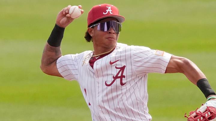 Alabama shortstop Justin Lebron (1) fields a ground ball