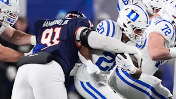 Dec 6, 2025; Charlotte, NC, USA; Duke Blue Devils running back Nate Sheppard (20) runs the ball during the first quarter against the Virginia Cavaliers during the 2025 ACC Championship game at Bank of America Stadium. Mandatory Credit: Jim Dedmon-Imagn Images