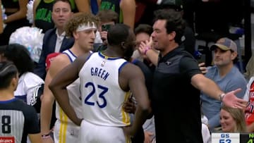 Draymond Green spoke with a fan during the Warriors game against the Pelicans. 
