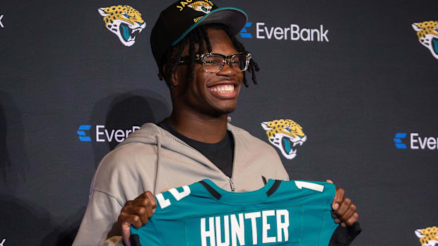 Apr 25, 2025; Jacksonville, FL, USA; Jacksonville Jaguars first round draft pick Travis Hunter poses for a photo during a pre