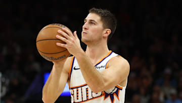 Nov 24, 2025; Phoenix, Arizona, USA; Phoenix Suns guard Collin Gillespie (12) against the Houston Rockets in the second half at Mortgage Matchup Center. Mandatory Credit: Mark J. Rebilas-Imagn Images