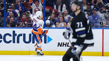 Feb 1, 2025; Tampa, Florida, USA; New York Islanders defenseman Adam Boqvist (34) celebrates after scoring a goal against the Tampa Bay Lightning in the second period at Amalie Arena. Mandatory Credit: Nathan Ray Seebeck-Imagn Images