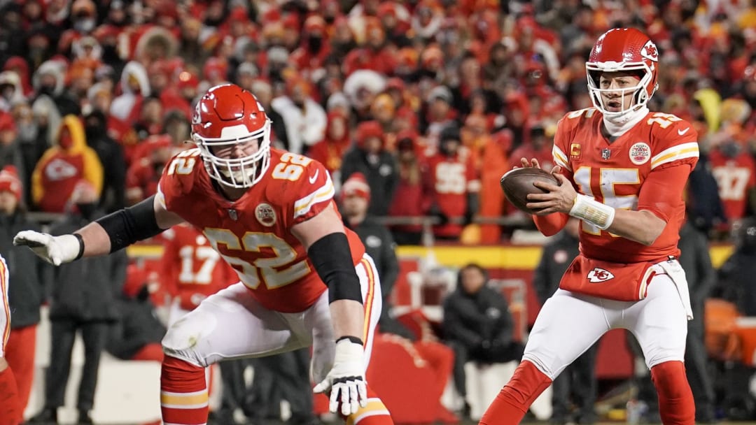 Jan 29, 2023; Kansas City, Missouri, USA; Kansas City Chiefs quarterback Patrick Mahomes (15) drops back to pass as guard Joe Thuney (62) blocks against the Cincinnati Bengals during the AFC Championship game at GEHA Field at Arrowhead Stadium. Mandatory Credit: Denny Medley-USA TODAY Sports