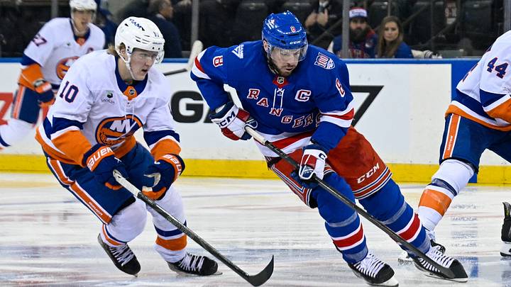 Jan 29, 2026; New York, New York, USA; New York Rangers center J.T. Miller (8) skates across center ice chased by New York Islanders right wing Simon Holmstrom (10) during the third period at Madison Square Garden. Mandatory Credit: Dennis Schneidler-Imagn Images Jan 29, 2026; New York, New York, USA; New York Rangers center J.T. Miller (8) skates across center ice chased by New York Islanders right wing Simon Holmstrom (10) during the third period at Madison Square Garden. Mandatory Credit: Dennis Schneidler-Imagn Images