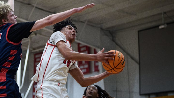Josiah King Sanders drives to the basket during a Freedom Christian at Berean Baptist boys' basketball playoff game on Thursday, Feb. 15, 2024. Josiah King Sanders drives to the basket during a Freedom Christian at Berean Baptist boys' basketball playoff game on Thursday, Feb. 15, 2024.