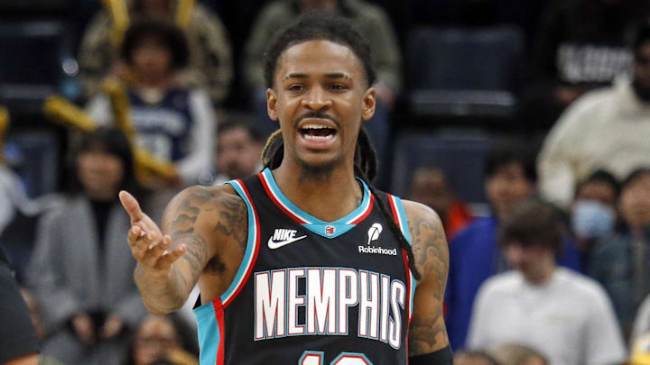 Dec 30, 2025; Memphis, Tennessee, USA; Memphis Grizzlies guard Ja Morant (12) reacts toward an official during the fourth quarter against the Philadelphia 76ers at FedExForum. Mandatory Credit: Petre Thomas-Imagn Images