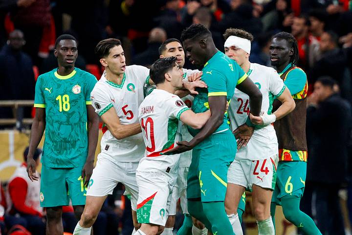 Senegal and Morocco players clash.