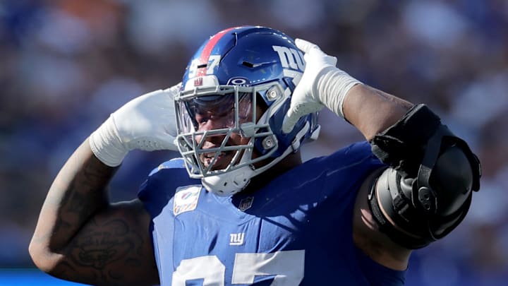 Sep 28, 2025; East Rutherford, New Jersey, USA; New York Giants defensive tackle Dexter Lawrence (97) reacts during the fourth quarter against the Los Angeles Chargers at MetLife Stadium. Mandatory Credit: Brad Penner-Imagn Images