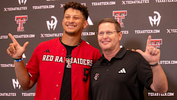 Kansas City Chiefs quarterback Patrick Mahomes and Texas Tech director of athletics Kirby Hocutt pose for a photo following a press conference at Jones AT&T Stadium, Friday, August 23, 2024.
