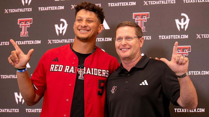 Kansas City Chiefs quarterback Patrick Mahomes and Texas Tech director of athletics Kirby Hocutt pose for a photo following a press conference at Jones AT&T Stadium, Friday, August 23, 2024.