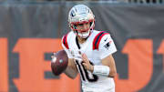 Nov 23, 2025; Cincinnati, Ohio, USA; New England Patriots quarterback Drake Maye (10) rolls out during the second half against the Cincinnati Bengals at Paycor Stadium. Mandatory Credit: Joseph Maiorana-Imagn Images