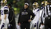 Nov 30, 2024; Eugene, Oregon, USA; Washington Huskies head coach Jedd Fisch walks out to the field during a time out during the second half against the Oregon Ducks at Autzen Stadium. Mandatory Credit: Troy Wayrynen-Imagn Images