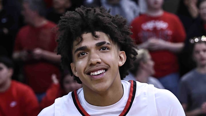 Newport's Taylen Kinney reacts after Newport's Ninth Region championship win over Cooper Tuesday, March 12, 2024. Kinney was injured in the first half. Newport's Taylen Kinney reacts after Newport's Ninth Region championship win over Cooper Tuesday, March 12, 2024. Kinney was injured in the first half.