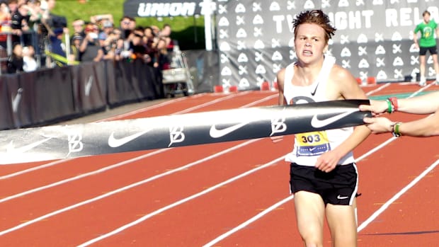 Tayvon Kitchen crossing finish line