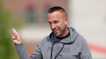 Green Bay Packers defensive coordinator Jeff Hafley interacts with fans before the start of practice on July 25, 2025, in Green Bay, Wis.