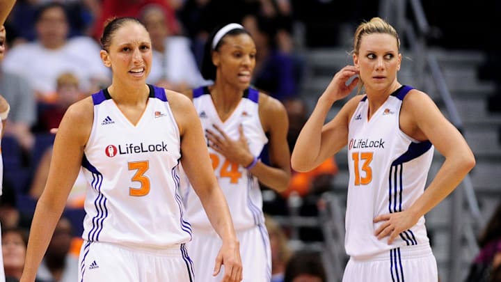 Sep 17 2011; Phoenix, AZ, USA; Phoenix Mercury guard Diana Taurasi (3) and teammate forward Penny Taylor (14) react on the court while playing against the Seattle Storm during the first half at the US Airways Center.  The Mercury defeated the Storm 92 - 83. Mandatory Credit: Jennifer Stewart-Imagn Images