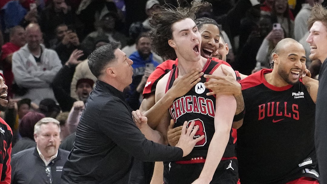 Mar 27, 2025; Chicago, Illinois, USA; Chicago Bulls guard Josh Giddey (3) celebrates with teammates after making the game-winning three point basket against the Los Angeles Lakers during the second half at United Center. Mandatory Credit: David Banks-Imagn Images