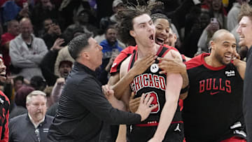 Mar 27, 2025; Chicago, Illinois, USA; Chicago Bulls guard Josh Giddey (3) celebrates with teammates after making the game-winning three point basket against the Los Angeles Lakers during the second half at United Center. Mandatory Credit: David Banks-Imagn Images