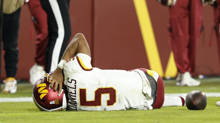 Commanders quarterback Jayden Daniels suffered a gruesome left elbow injury during Sunday night's loss to the Seahawks.