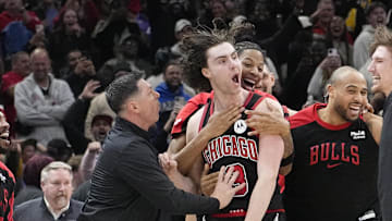 Mar 27, 2025; Chicago, Illinois, USA; Chicago Bulls guard Josh Giddey (3) celebrates with teammates after making the game-winning three point basket against the Los Angeles Lakers during the second half at United Center. Mandatory Credit: David Banks-Imagn Images