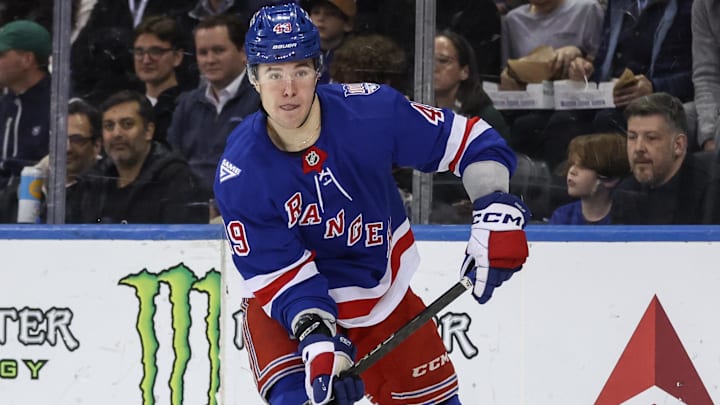 Apr 2, 2026; New York, New York, USA;  New York Rangers right wing Jaroslav Chmelar (49) controls the puck in the third period against the Montréal Canadiens at Madison Square Garden.