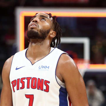 Apr 5, 2024; Memphis, Tennessee, USA; Detroit Pistons forward Troy Brown Jr. (7) reacts as he walks toward the bench at the end of the third quarter against the Memphis Grizzlies at FedExForum. Mandatory Credit: Petre Thomas-USA TODAY Sports