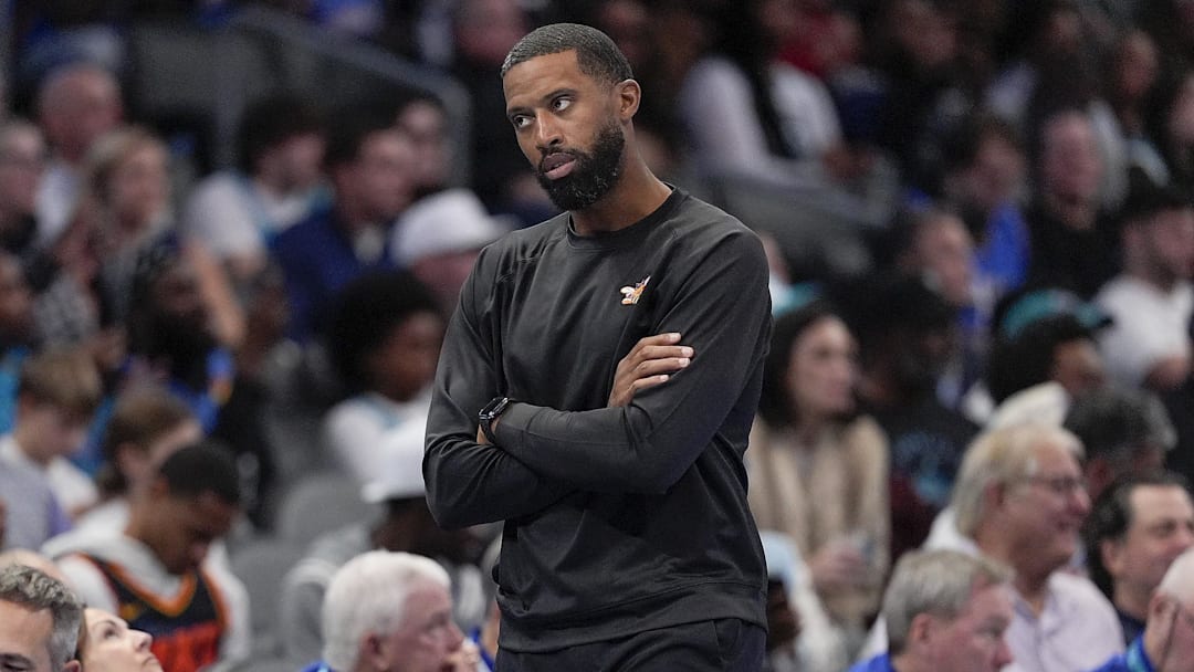 Nov 15, 2025; Charlotte, North Carolina, USA; Charlotte Hornets head coach Charles Lee during the first half against the Oklahoma City Thunder at Spectrum Center. Mandatory Credit: Jim Dedmon-Imagn Images