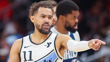 Trae Young #11 of the Atlanta Hawks reacts during a game against the Dallas Mavericks.