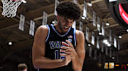 Dec 2, 2025; Durham, North Carolina, USA; Duke Blue Devils forward Cameron Boozer (12) reacts after forcing a turnover against the Florida Gators during the first half at Cameron Indoor Stadium. Mandatory Credit: Rob Kinnan-Imagn Images