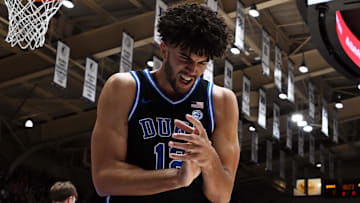 Dec 2, 2025; Durham, North Carolina, USA; Duke Blue Devils forward Cameron Boozer (12) reacts after forcing a turnover against the Florida Gators during the first half at Cameron Indoor Stadium. Mandatory Credit: Rob Kinnan-Imagn Images