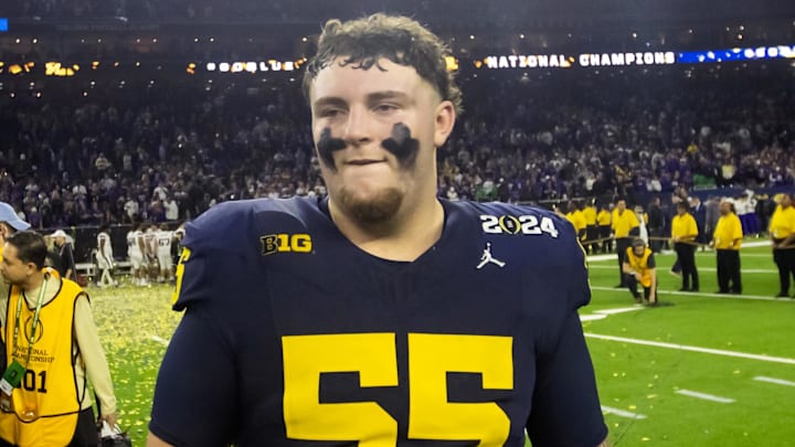 Jan 8, 2024; Houston, TX, USA; Michigan Wolverines defensive lineman Mason Graham (55) against the Washington Huskies during the 2024 College Football Playoff national championship game at NRG Stadium. Mandatory Credit: Mark J. Rebilas-Imagn Images