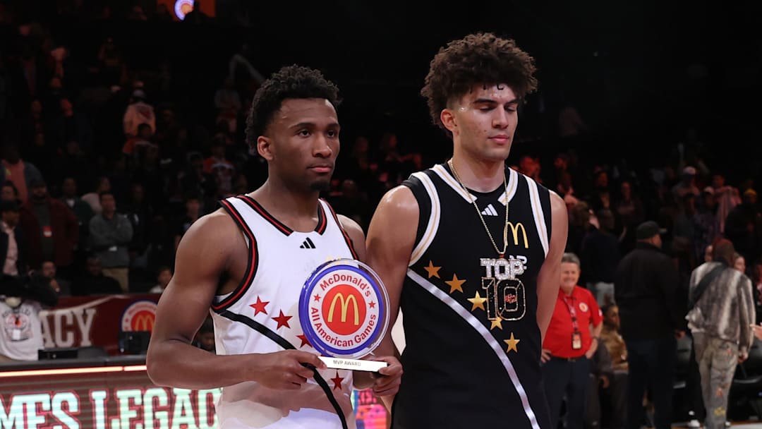 Apr 1, 2025; Brooklyn, NY, USA; McDonald's All American West guard Darryn Peterson (22) and McDonald's All American East forward Cameron Boozer (12) pose for photos after the game at Barclays Center. Mandatory Credit: Pamela Smith-Imagn Images