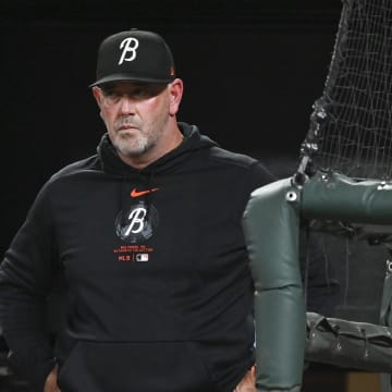 Jul 26, 2024; Baltimore, Maryland, USA;  Baltimore Orioles manager Brandon Hyde stands in the dugout.