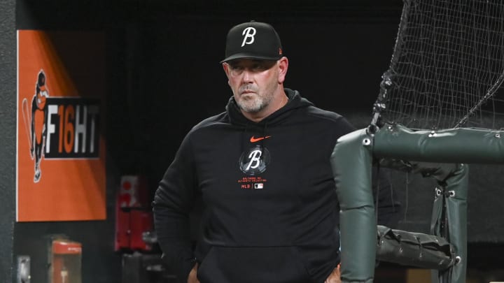 Jul 26, 2024; Baltimore, Maryland, USA;  Baltimore Orioles manager Brandon Hyde stands in the dugout.