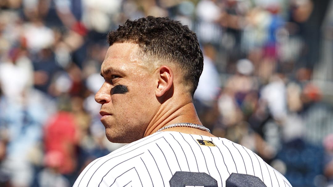 Feb 21, 2026; Tampa, Florida, USA; New York Yankees outfielder Aaron Judge (99) during the National Anthem before the Spring Training game against the Detroit Tigers at George M. Steinbrenner Field. Mandatory Credit: Morgan Tencza-Imagn Images