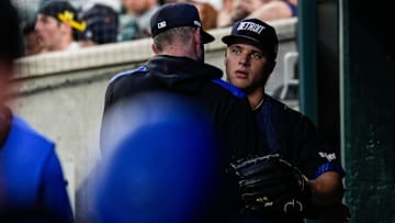 Detroit Tigers pitcher Jackson Jobe (21) hugs pitching coach Chris Fetter (41) after pitching the fifth inning against Kansas City Royals at Comerica Park in Detroit on Friday, April 18, 2025.